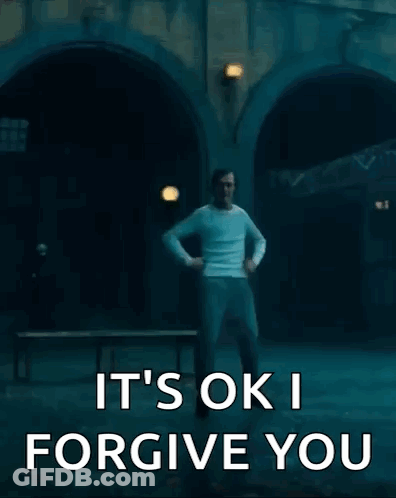 Man Dancing In Dark Room Saying It's Ok I Forgive You GIF