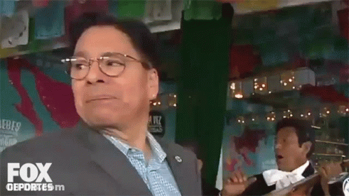 Man Dancing In Front Of Bebe Sign GIF