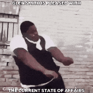 Man Dancing In Front Of Brick Wall GIF