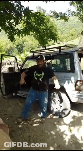 Man Dancing In Front Of Car GIF