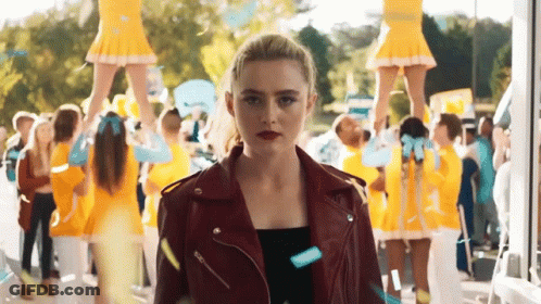 Man Dancing In Front Of Coca Cola Sign GIF