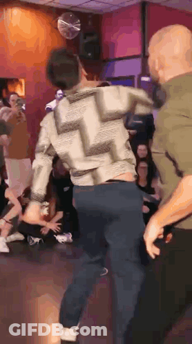 Man Dancing In Front Of Crowd At Club GIF