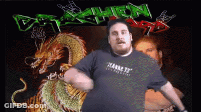 Man Dancing In Front Of Dragon And Death Sign GIF
