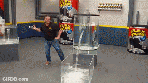 Man Dancing In Front Of Flex Tape Containers GIF