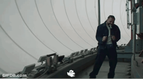 Man Dancing In Front Of Ghost GIF