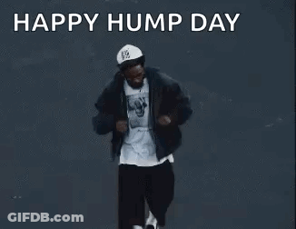Man Dancing In Front Of Happy Hump Day Sign GIF