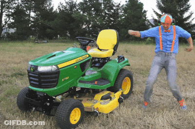 Man Dancing In Front Of John Deere Tractor GIF