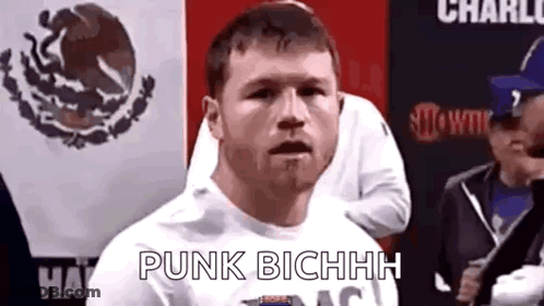 Man Dancing In Front Of Red Brick Wall Saying Come At Me Bro GIF