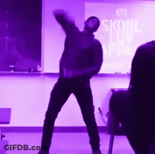 Man Dancing In Front Of Skool Love Sign GIF