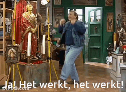 Man Dancing In Front Of Statue Saying Het Werkt Het Werkt GIF