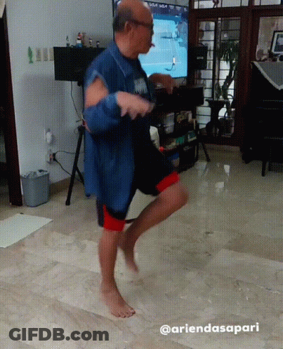 Man Dancing In Front Of TV @Ariendasapari GIF