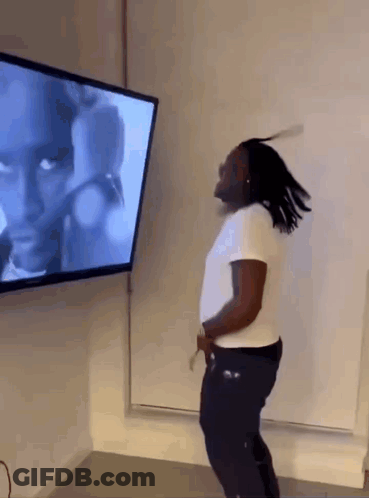 Man Dancing In Front Of TV GIF