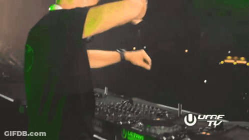 Man Dancing In Front Of UHF TV Sign GIF
