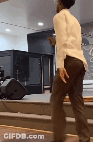 Man Dancing In Front Of Veal Sign GIF