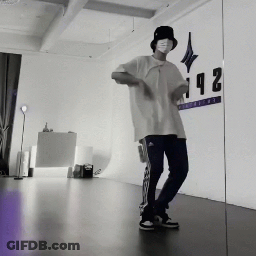 Man Dancing In Front Of Wall Number 142 GIF