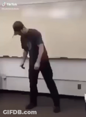 Man Dancing In Front Of Whiteboard GIF