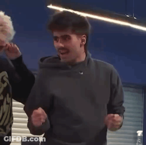 Man Dancing In Gray Sweater GIF