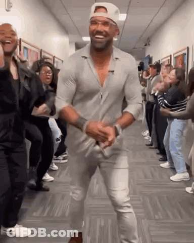 Man Dancing In Hallway Crowd GIF