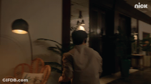 Man Dancing In Hallway With Nick Logo GIF