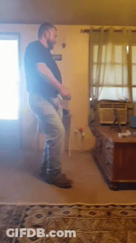 Man Dancing In Living Room With Air Conditioner GIF