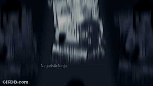 Man Dancing In Living Room With Arms Outstretched GIF