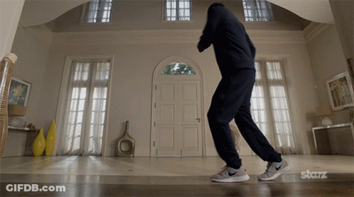 Man Dancing In Living Room With Starz Logo GIF