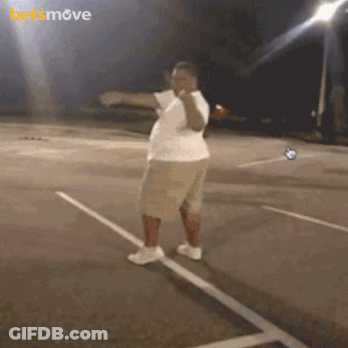 Man Dancing In Parking Lot With Betsmove Logo GIF