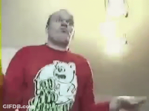 Man Dancing In Red Shirt With Bear GIF