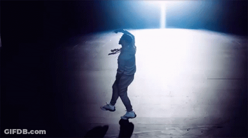Man Dancing In Spotlight GIF