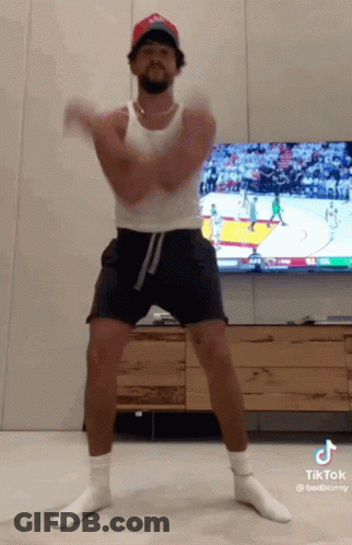 Man Dancing In Tank Top And Shorts GIF