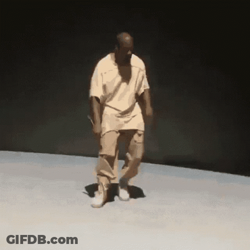 Man Dancing In White Shirt And Khakis GIF