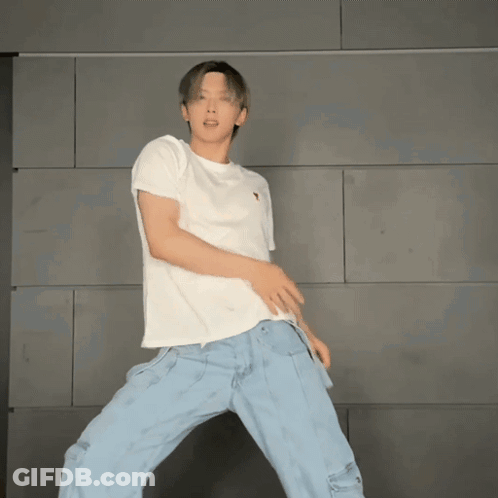 Man Dancing In White T-Shirt And Blue Jeans GIF