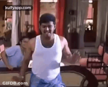 Man Dancing In White Tank Top GIF