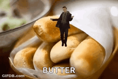 Man Dancing On Bowl Of Rolls With Butter GIF