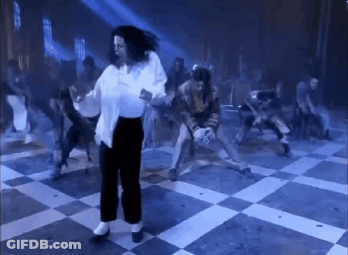 Man Dancing On Checkered Floor GIF
