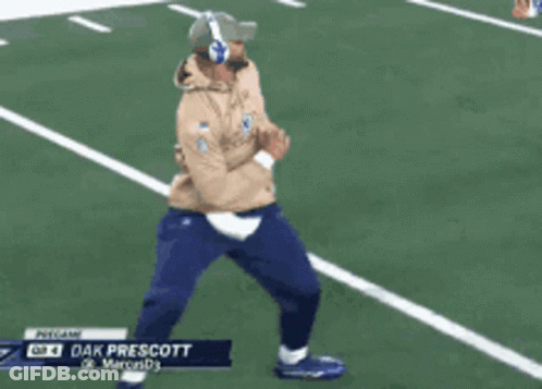 Man Dancing On Football Field With Headphones And Hat GIF