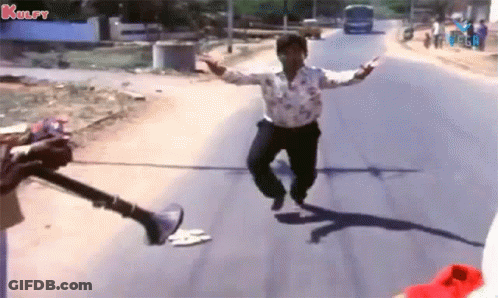 Man Dancing On Road Beside Loudspeaker GIF