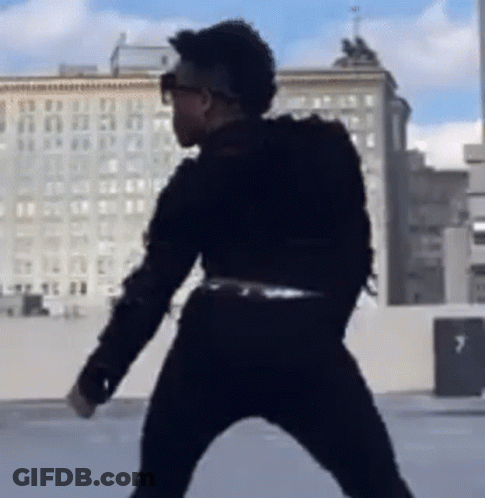 Man Dancing On Rooftop GIF