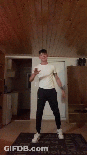 Man Dancing On Rug Saying Enola GIF