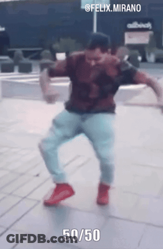 Man Dancing On Sidewalk With 50/50 Below GIF