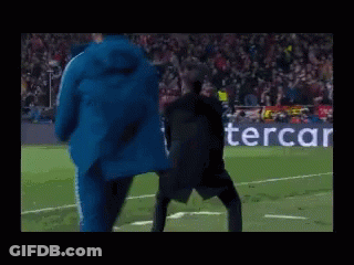 Man Dancing On Soccer Field In Front Of PS4 Logo GIF