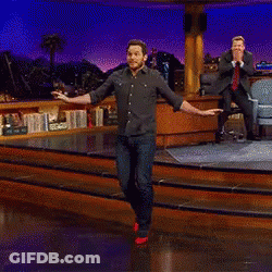 Man Dancing On Stage In Dark Room GIF