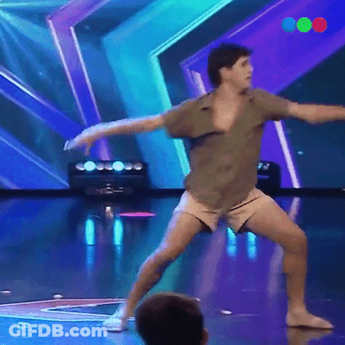 Man Dancing On Stage In Front Of ABC Sign GIF