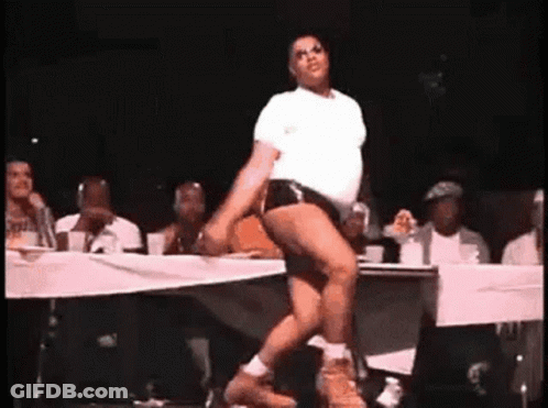 Man Dancing On Stage In Front Of Crowd GIF