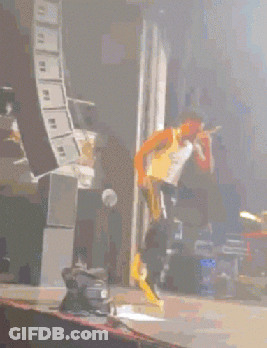 Man Dancing On Stage In Front Of Keyboard GIF