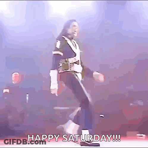 Man Dancing On Stage Saying Happy Saturday GIF