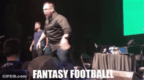Man Dancing On Stage With Fantasy Football GIF