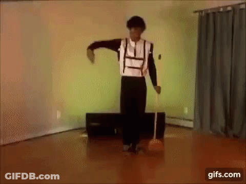 Man Dancing On Wooden Floor With Microphone GIF