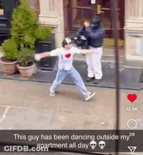 Man Dancing Outside Apartment GIF