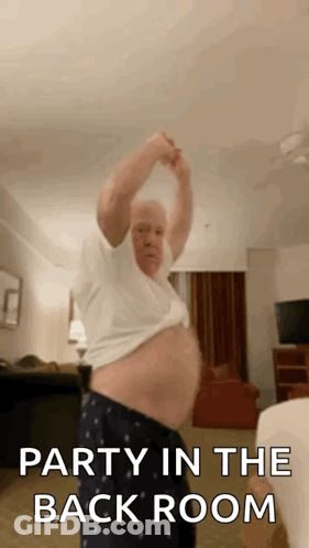 Man Dancing With Party In The Back Room GIF